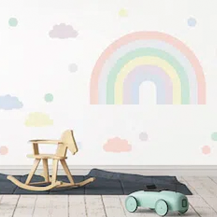 Muursticker met grote pastel regenboog en wolkjes